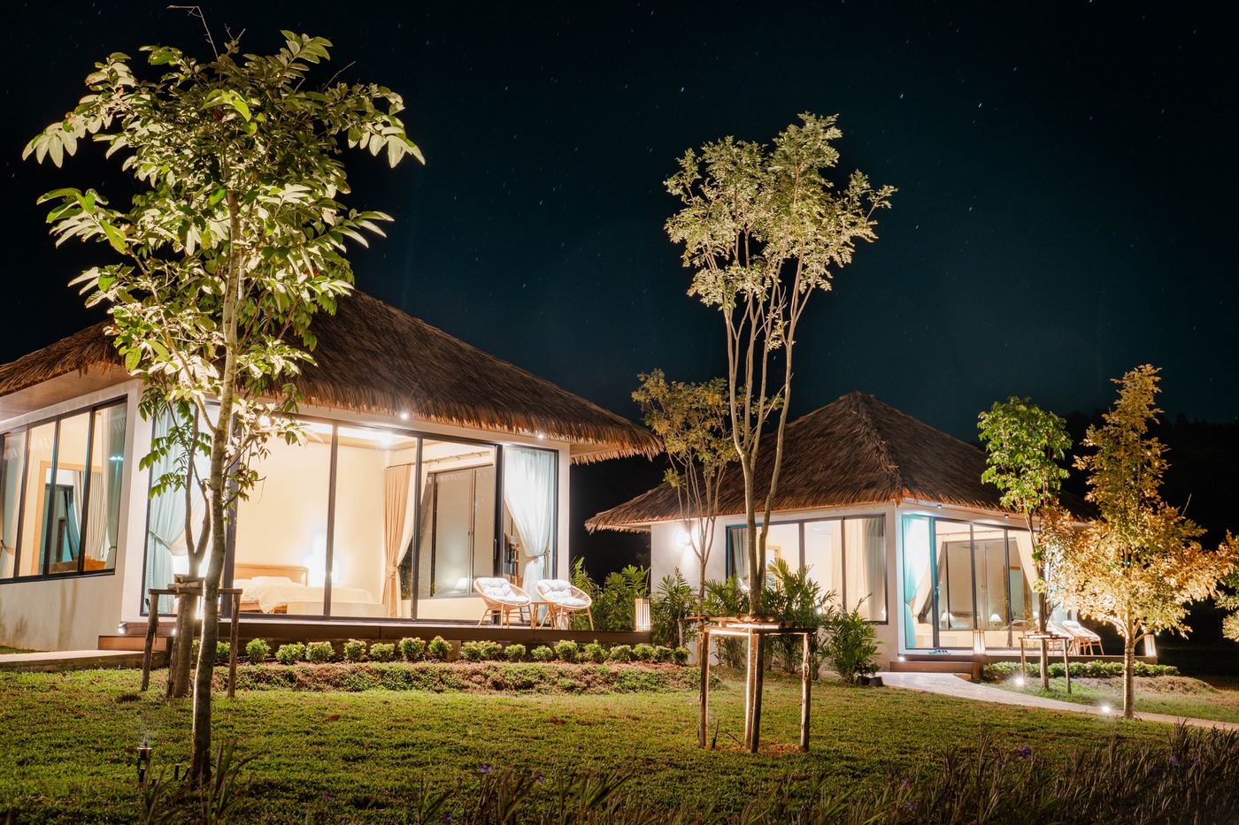 Mountain View Villas lit at night under the stars