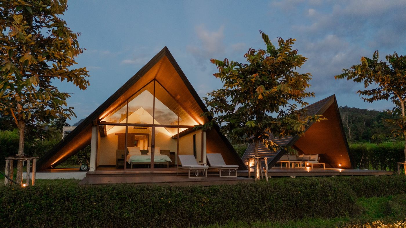 Sunset Pavilion Villa at dusk with lights on