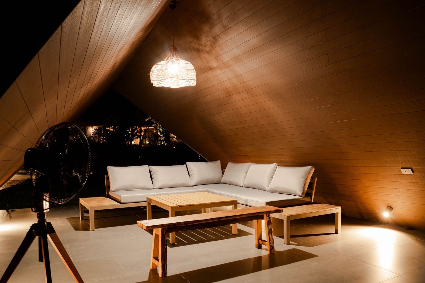 Private pavilion lounge lit at night